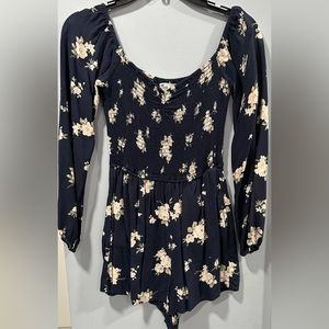 Size small, short romper with long sleeves